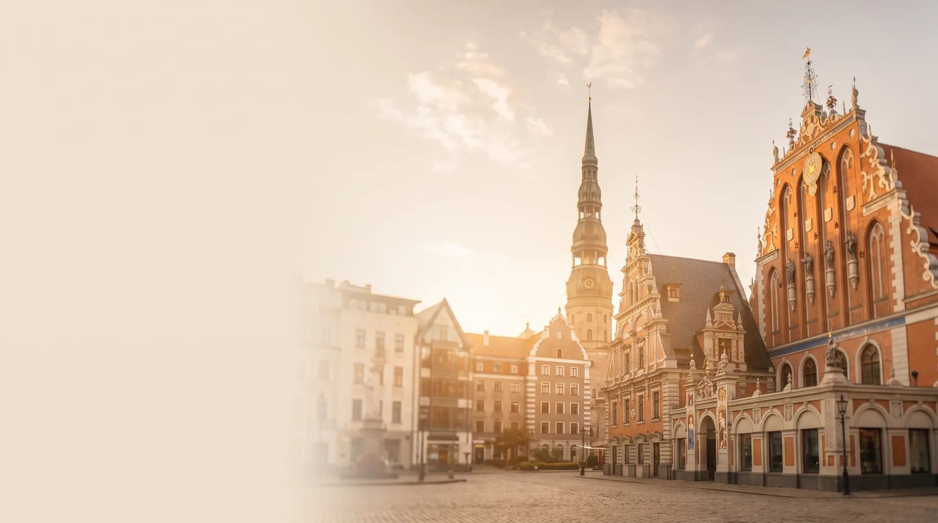 The House of the Blackheads and Riga's old town spires at golden hour