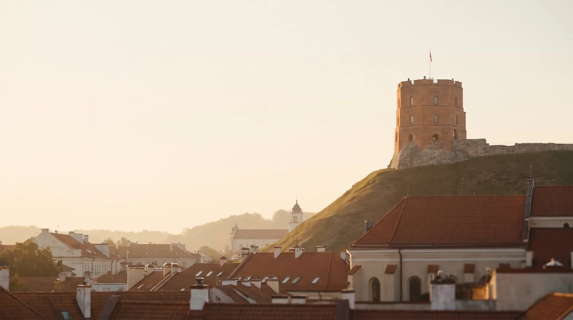 Gediminas Tower above the Vilnius old town at golden hour