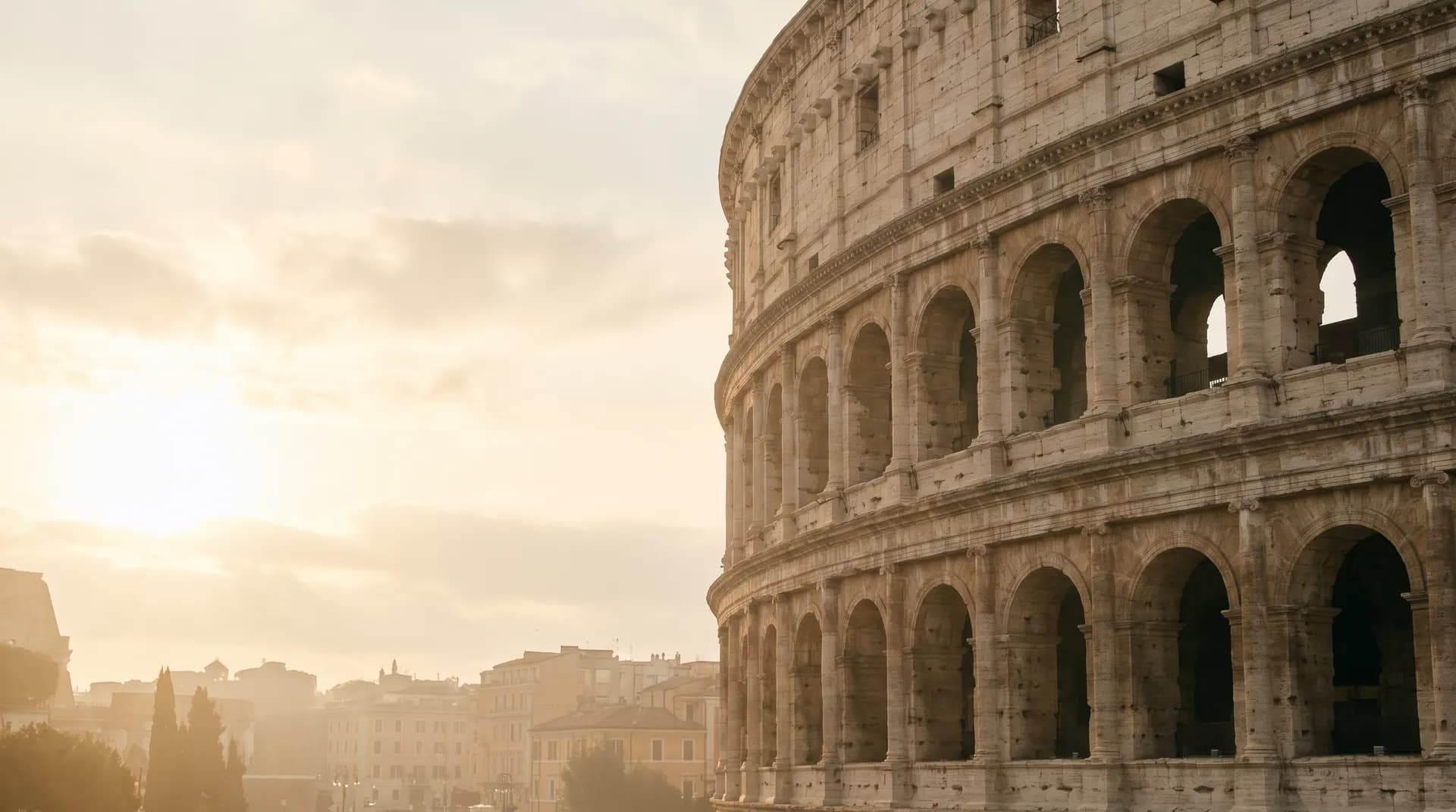 The Colosseum's ancient arches in Rome at golden hour