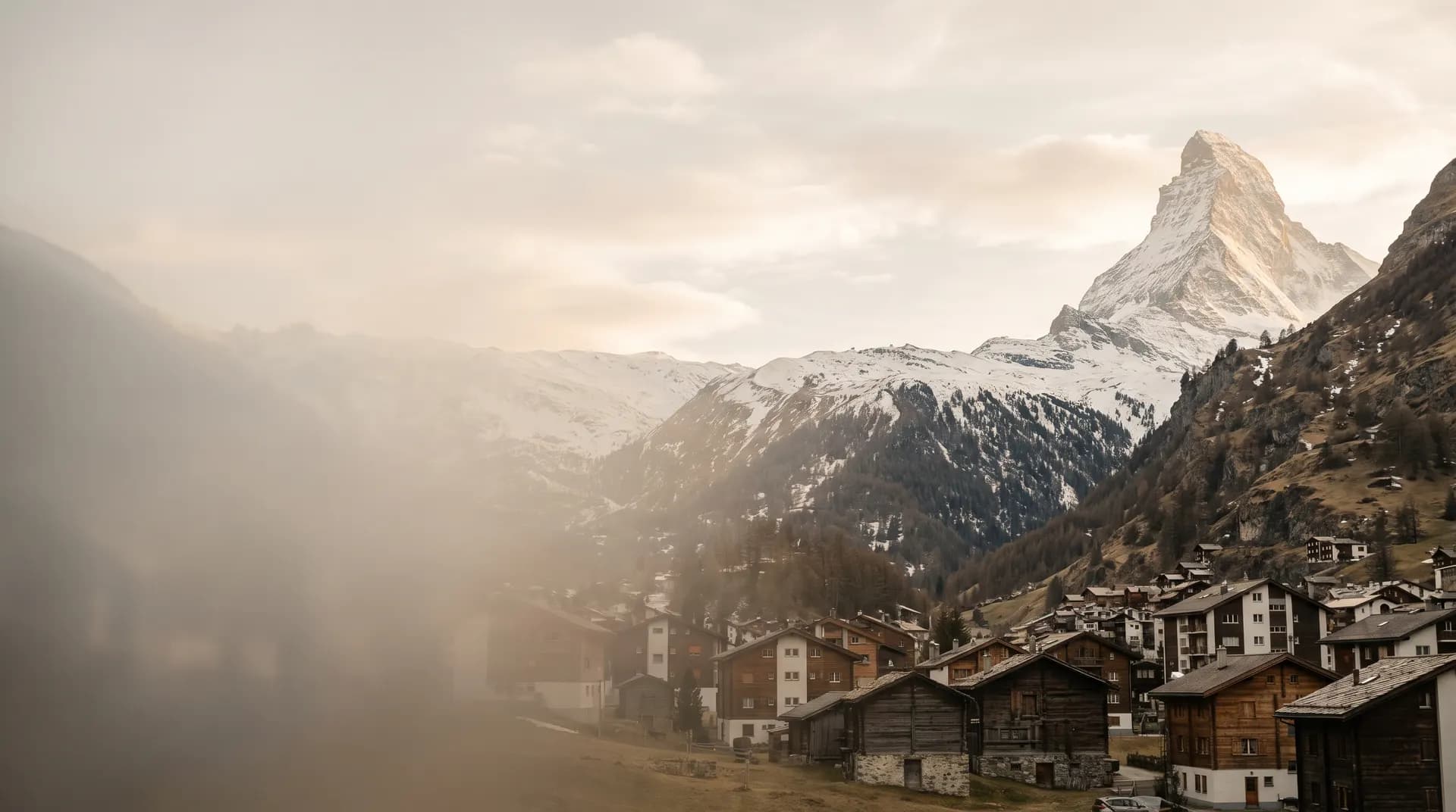 The Matterhorn above an alpine village at golden hour
